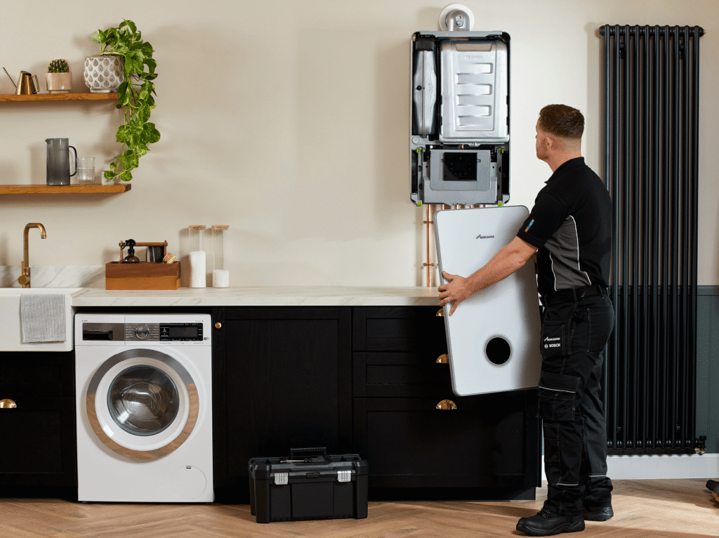 Boiler Engineer With Cover off Boiler